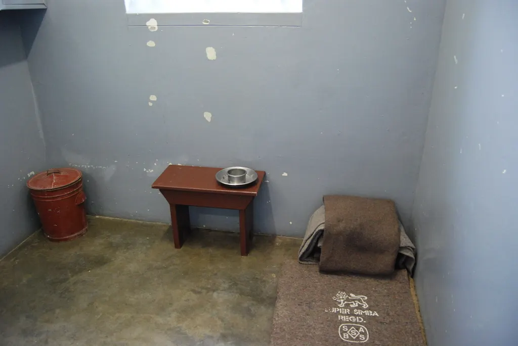 Nelson Mandela's small former prison cell on Robben Island, South Africa