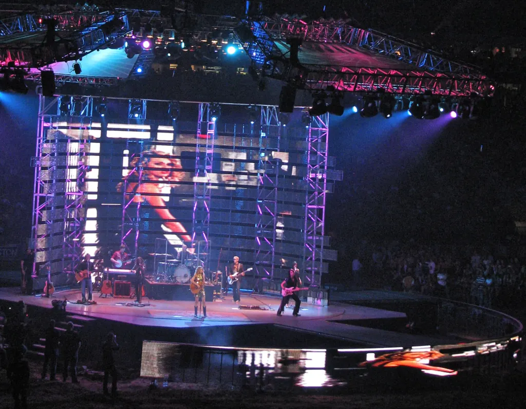 Taylor Swift performing onstage during her Fearless Tour in 2009