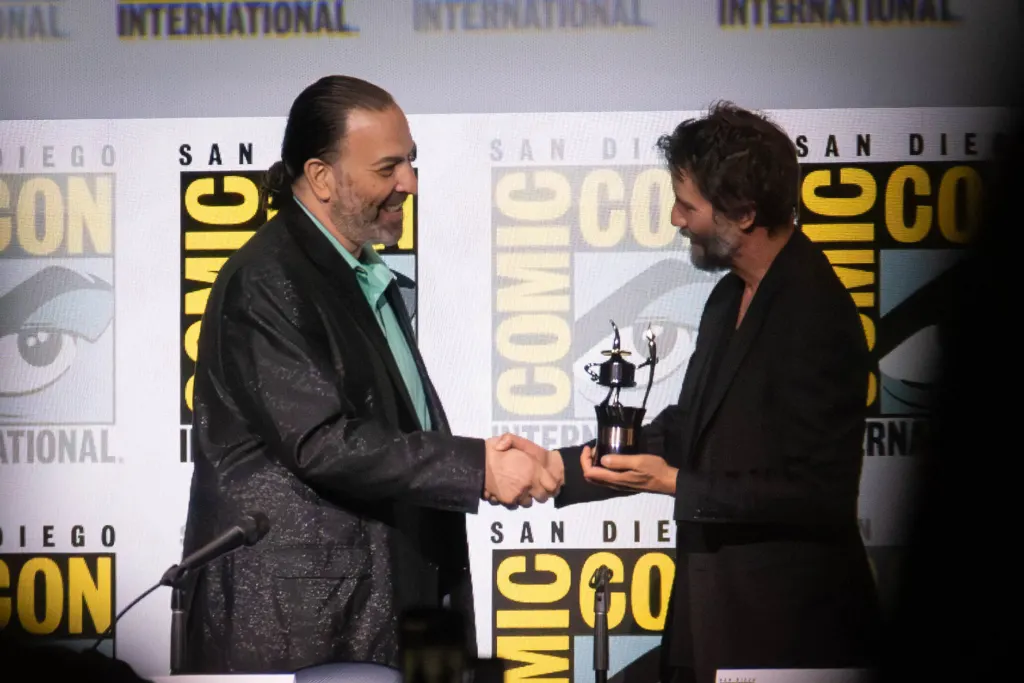 Keanu Reeves onstage receiving the Inkpot Award at San Diego Comic-Con in July 2024