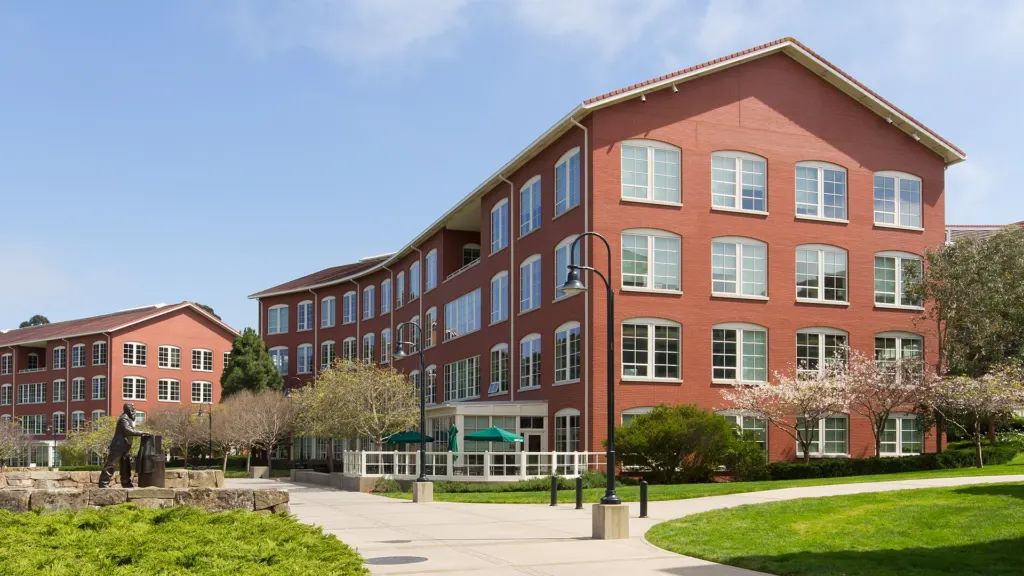 Buildings C and D of the Letterman Digital Arts Center, four-story brick-and-stucco office buildings in the Presidio of San Francisco
