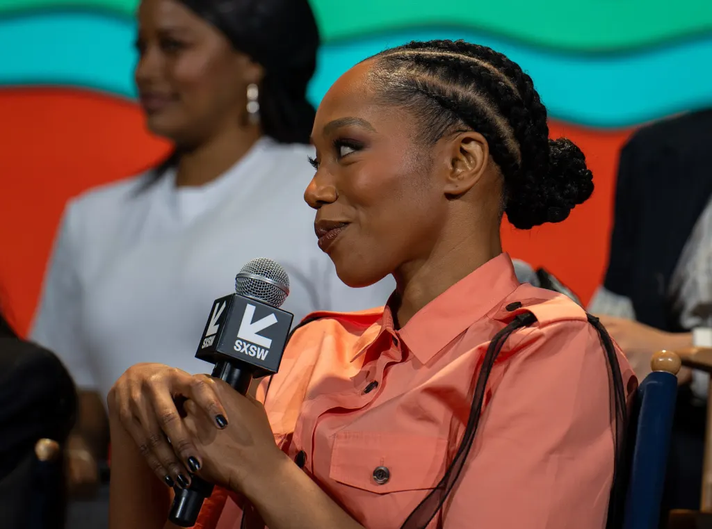 Clayface co-star Naomi Ackie speaking on a panel at SXSW 2026 in Austin, Texas