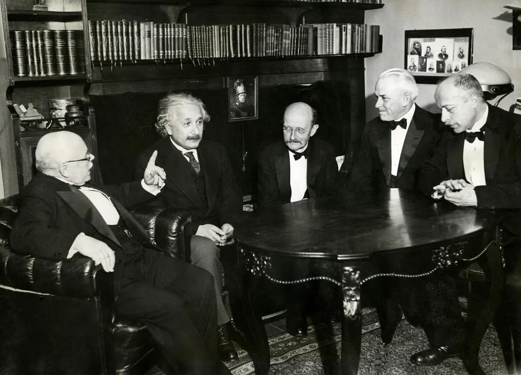 Albert Einstein seated with physicists Walther Nernst, Max Planck, Robert Millikan and Max von Laue at a dinner in Berlin in November 1931