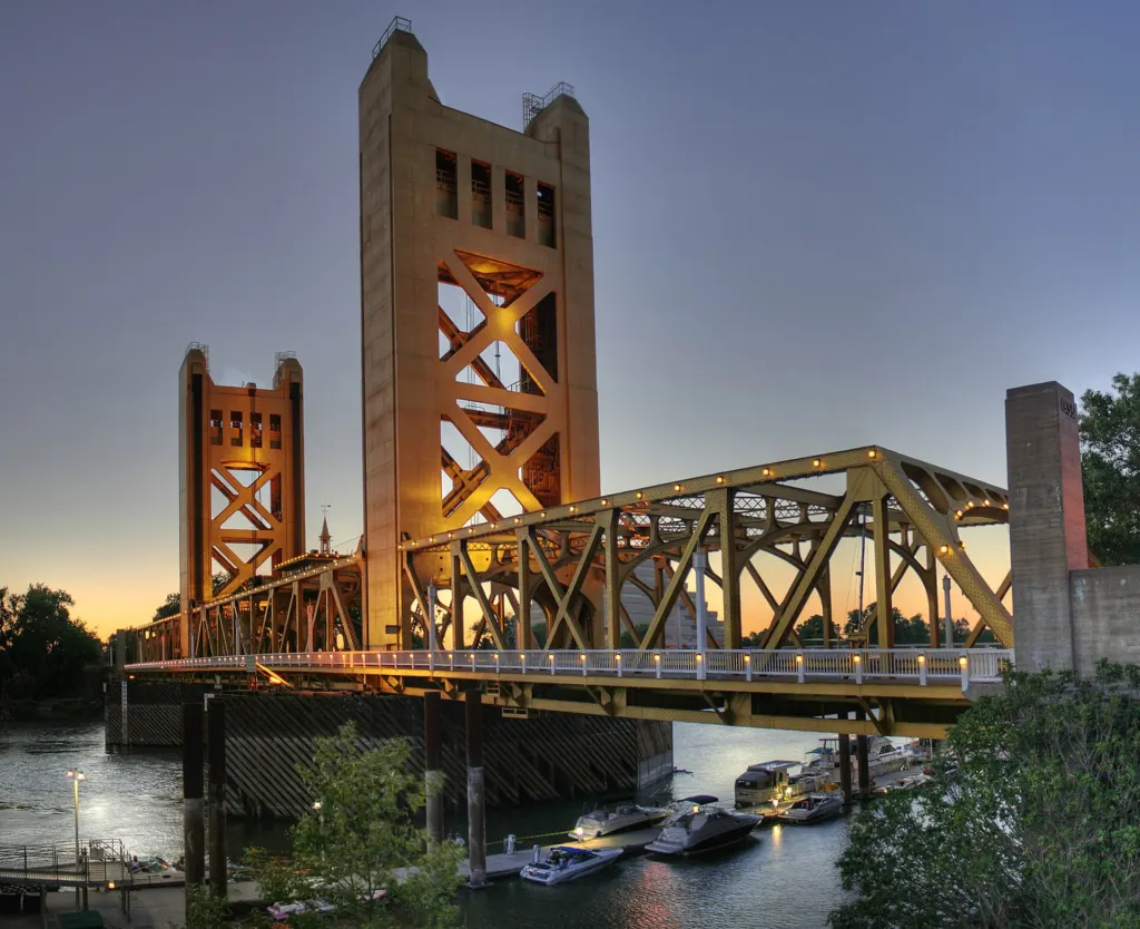 The gold-colored Tower Bridge over the Sacramento River in Sacramento, California