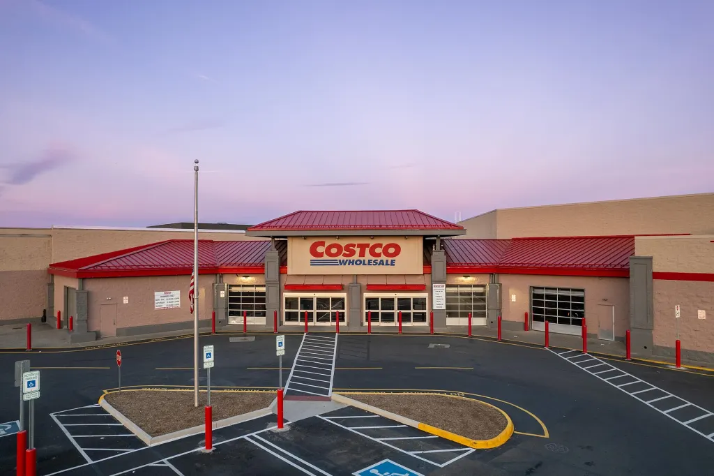 Exterior of the Costco Wholesale warehouse store in Fredericksburg, Virginia, with its parking lot in front