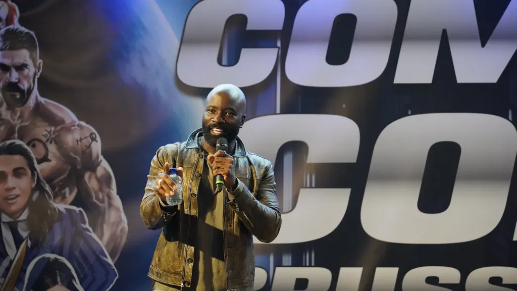 Actor Mike Colter on stage during a fan Q&A at Comic Con Brussels in November 2023