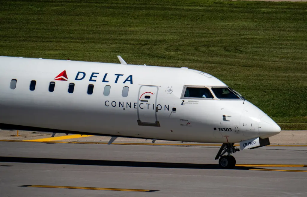 A Delta Connection Bombardier CRJ900 regional jet operated by Endeavor Air at Minneapolis-Saint Paul International Airport