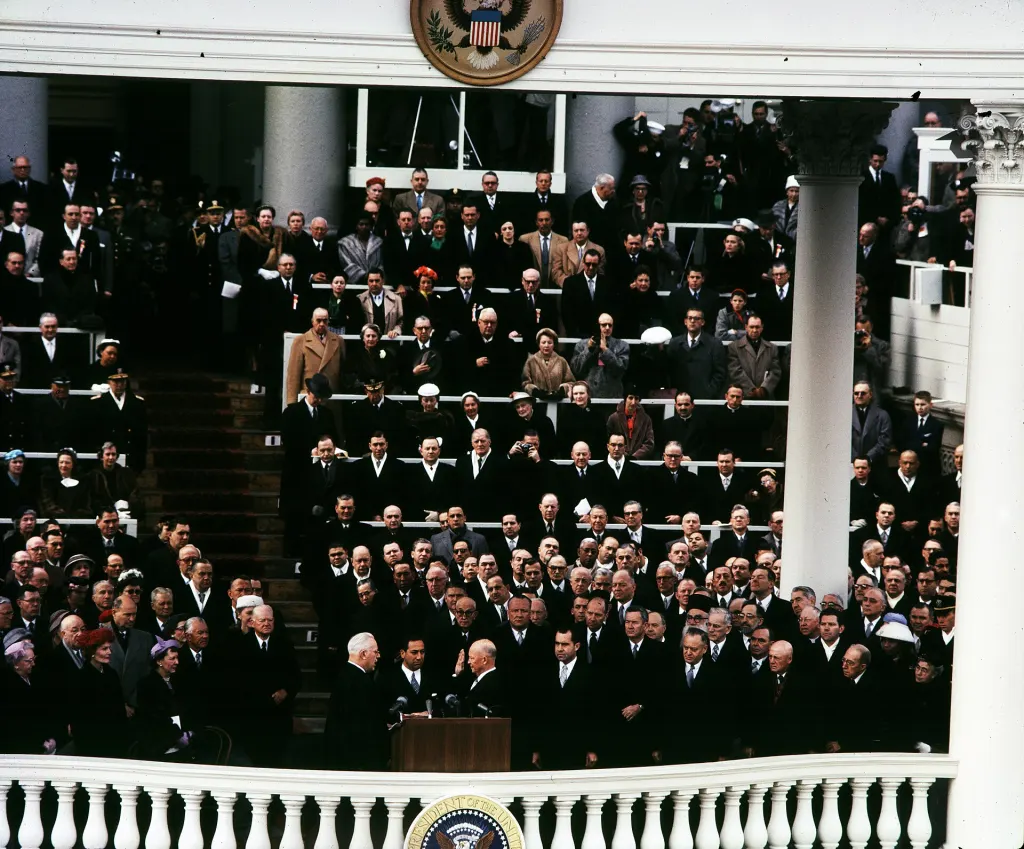 Chief Justice Earl Warren administering the oath of office to Dwight D. Eisenhower on the east portico of the U.S. Capitol