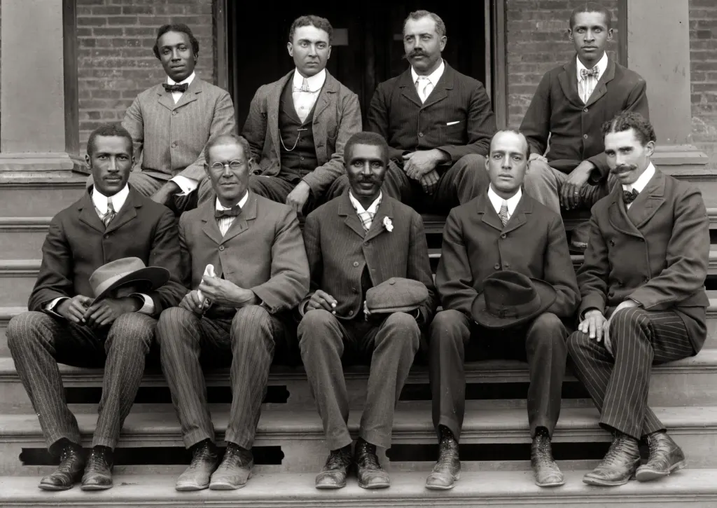 George Washington Carver seated in the front row center among fellow Tuskegee Institute staff members in a group photograph from about 1902