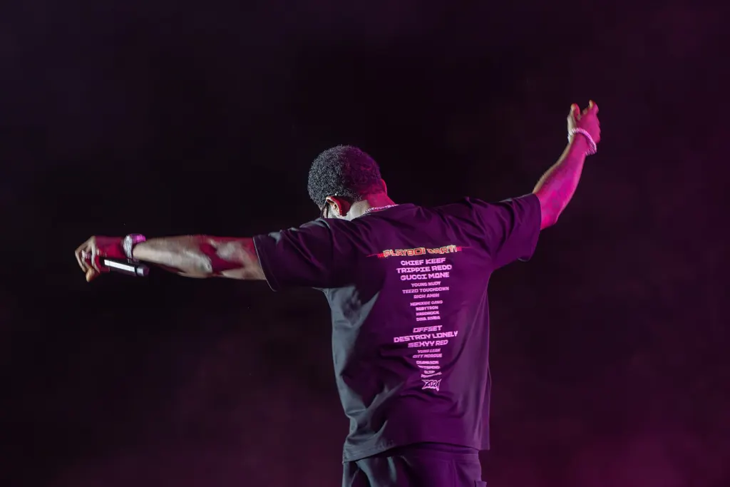 Gucci Mane performing on stage at the Clout Festival in 2024