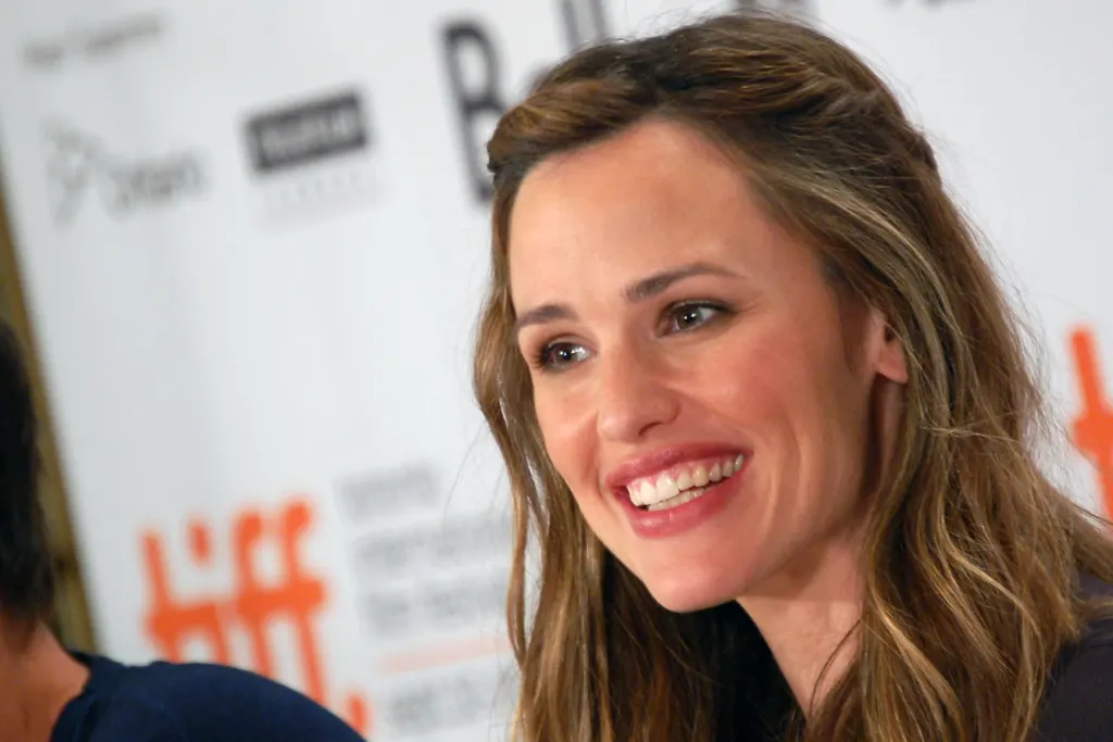 Jennifer Garner smiling at a press conference at the Toronto International Film Festival in September 2009