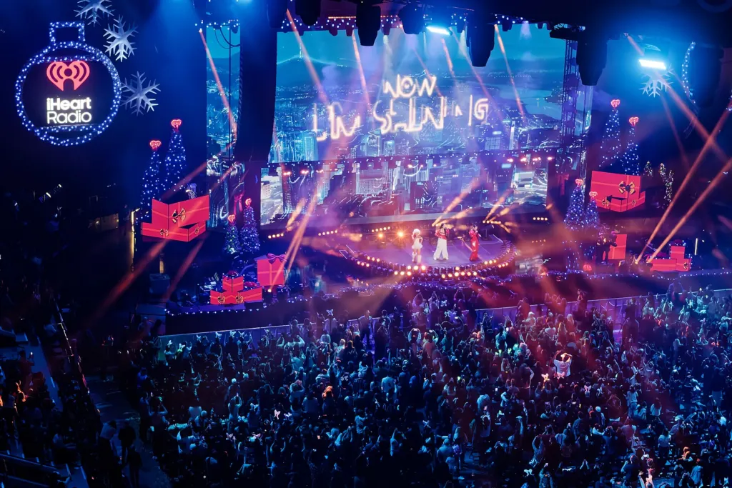 The KPop Demon Hunters singers performing on stage at the Jingle Ball concert in December 2025