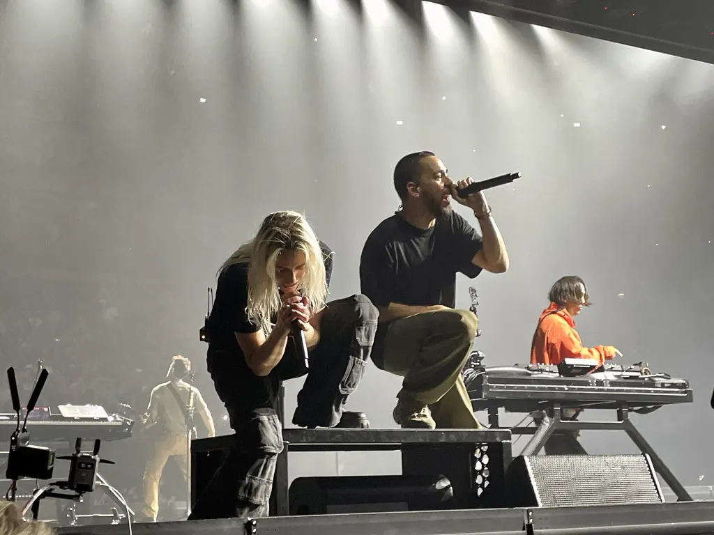 Emily Armstrong, Mike Shinoda and Joe Hahn of Linkin Park performing on stage at the O2 Arena in London on September 24, 2024