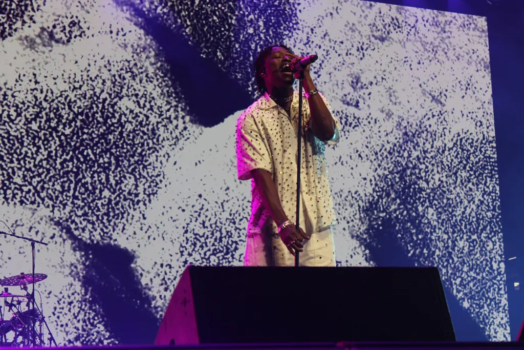 Lucky Daye performing on stage at the Essence Festival of Culture in New Orleans in July 2025