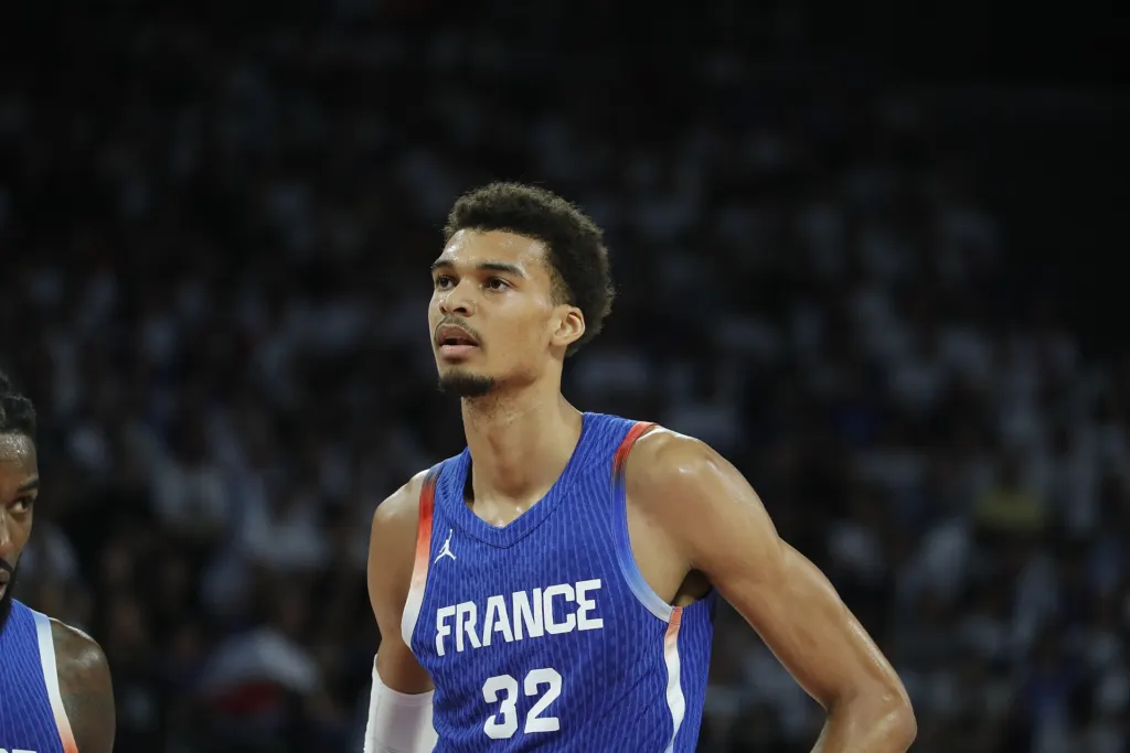 Victor Wembanyama in a France national team uniform on court during a July 2024 game