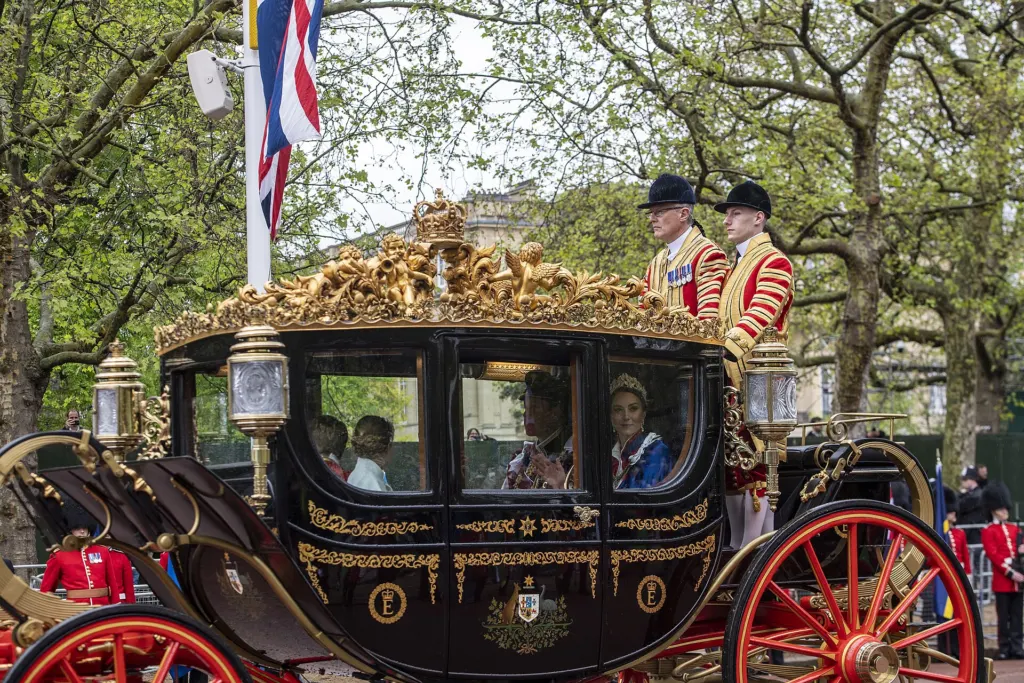 The Prince and Princess of Wales in ceremonial dress during the return procession from the coronation of King Charles III in London, May 6, 2023