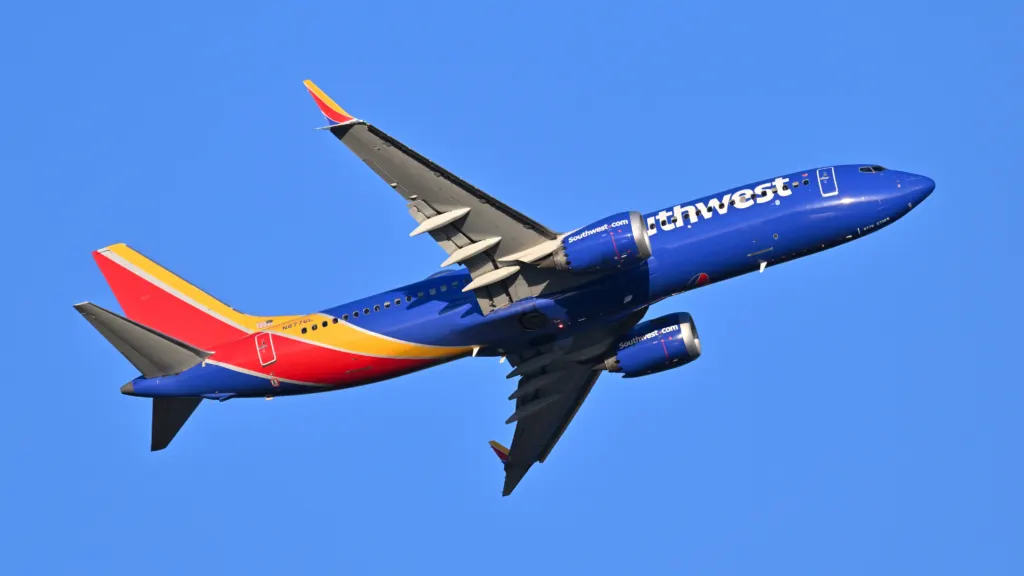A Southwest Airlines Boeing 737-8 MAX, registration N8776L, departing Boston from runway 22R in March 2025