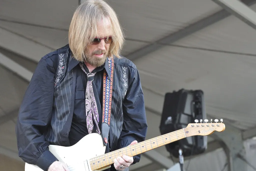Tom Petty performing with the Heartbreakers at the New Orleans Jazz and Heritage Festival in April 2012